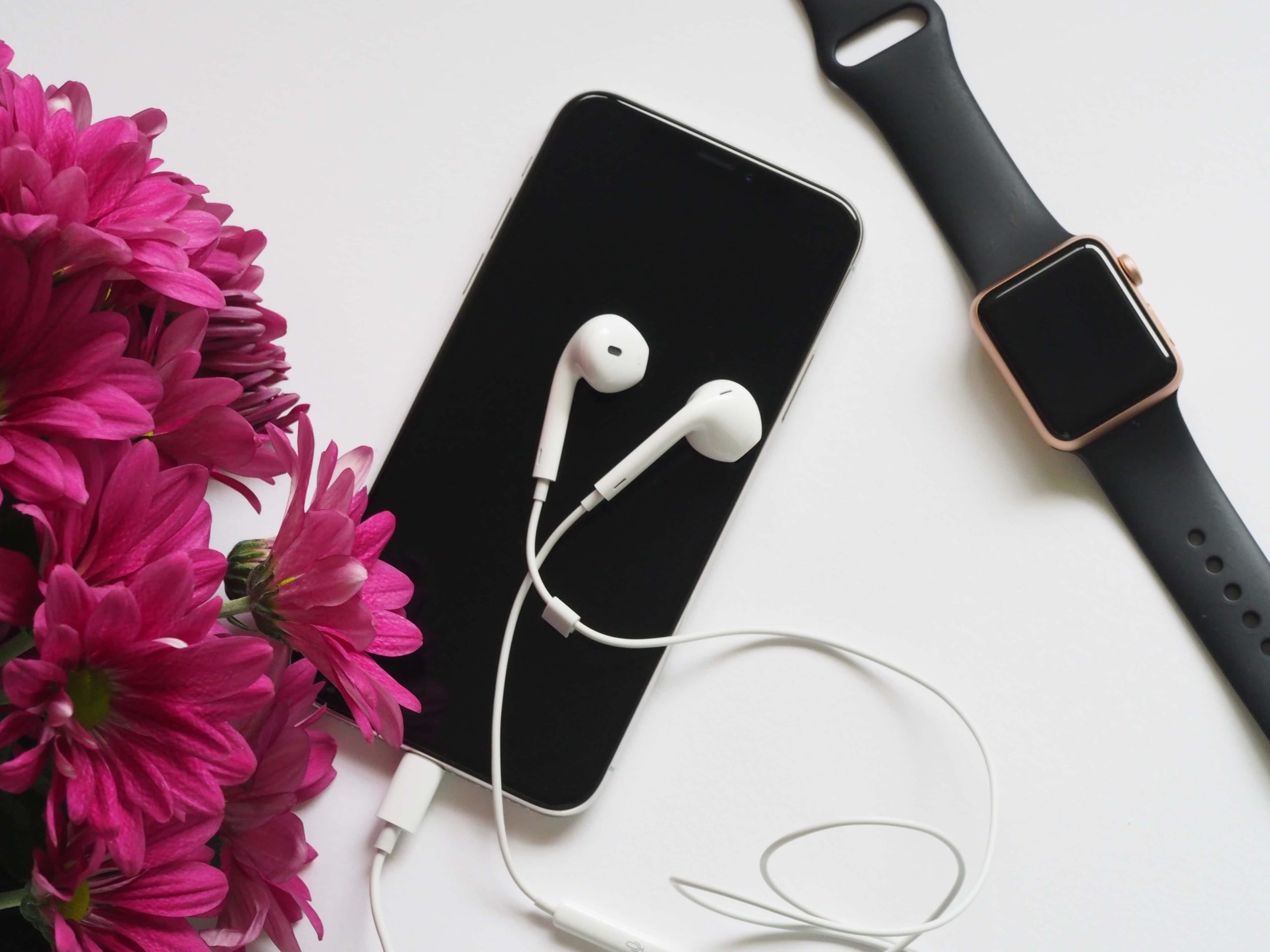 Close up photography of earphones on top of iphone 6 near 748598 scaled.jpg